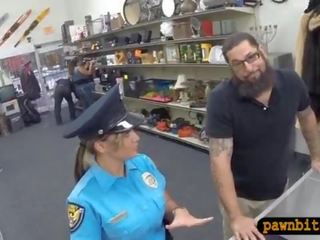 Police Officer with big boobs pawns her pussy for cash