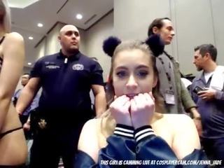 Young lady is mickey mouse ear swallowing a dildo on comic con